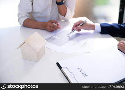 Business people signing contract making a deal with real estate agent Concept for consultant and home insurance concept