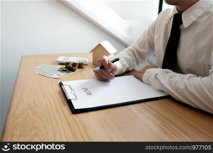 Business people signing contract making a deal with real estate agent Concept for consultant and home insurance concept