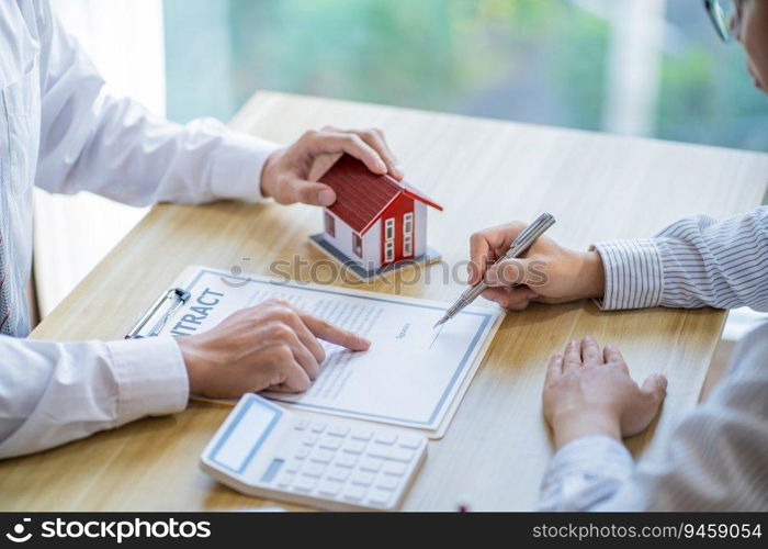 Business people signing contract making deal with real estate agent Concept for consultant home insurance Real estate investment Property insurance security. Real estate agent offer house.