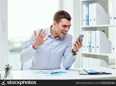 business, people, stress and technology concept - close up of angry businessman with smartphone shouting
