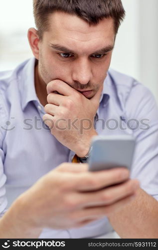 business, people, stress and technology concept - close up of businessman with smartphone