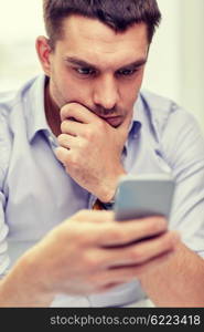 business, people, stress and technology concept - close up of businessman with smartphone