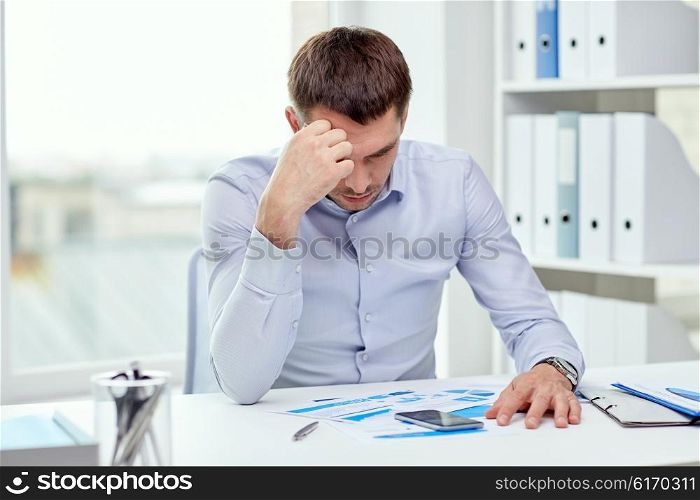 business, people, stress, deadline and technology concept - close up of businessman with smartphone