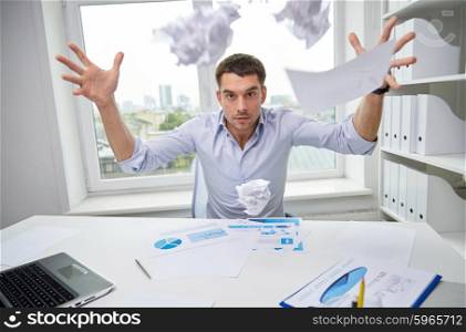 business, people, stress, emotions and fail concept - angry businessman throwing papers in office