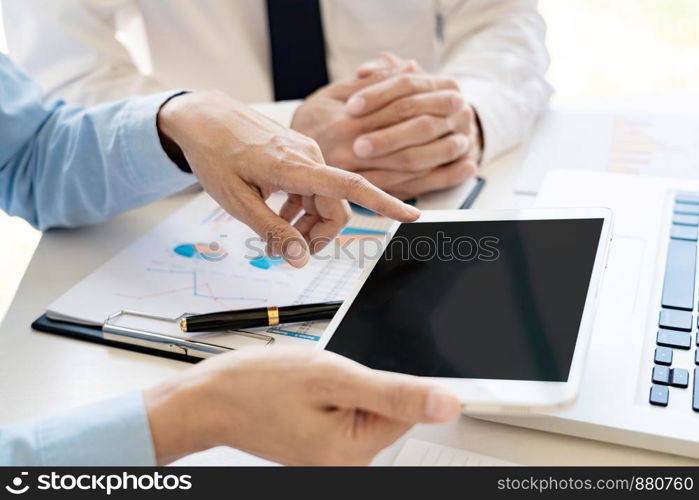 Business People Talking Discussing with coworker planning analyzing financial document data charts and graphs in Meeting and successful teamwork Concept