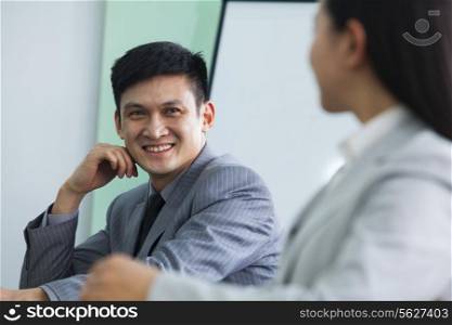 Business People Talking in a Conference Room