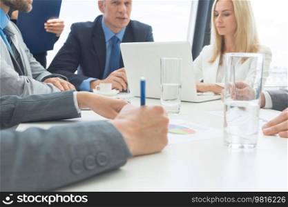 Business people team diverse coworkers, executive managers group at meeting. Professional businesspeople working together on research plan in boardroom.. Managers group at meeting