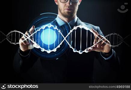 business, people, technology and cyberspace concept - close up of businessman in suit working with virtual reality screen and dna molecule projection over black background. close up of businessman with virtual dna molecule
