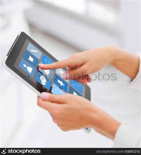 business, people, technology and internet concept - close up of female hands choosing application on tablet pc computer screen