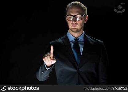 business, people, technology, cyberspace and office concept - close up of businessman in suit working with invisible virtual reality screen. close up of businessman touching virtual screen