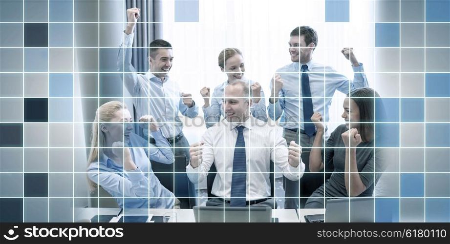 business, people, technology, gesture and teamwork concept - smiling business team raising hands and celebrating victory in office over blue squared grid background