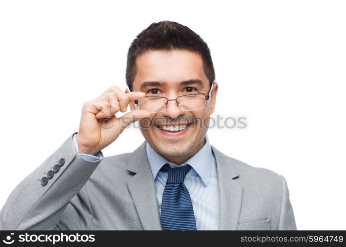 business, people, vision and office concept - happy smiling businessman in eyeglasses and suit