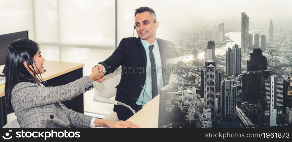 Business people wearing headset celebrate working in office . Call center, telemarketing, customer support agent provide service on telephone video conference call. broaden view. Business people wearing headset celebrate working in office broaden view