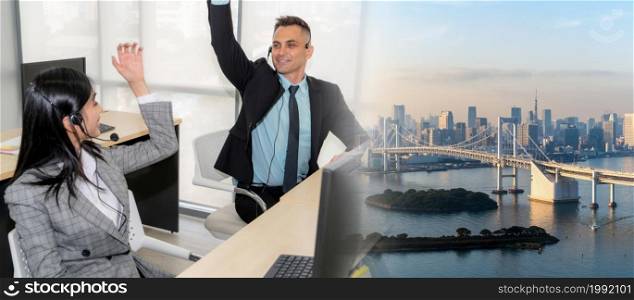 Business people wearing headset celebrate working in office . Call center, telemarketing, customer support agent provide service on telephone video conference call. broaden view. Business people wearing headset celebrate working in office broaden view
