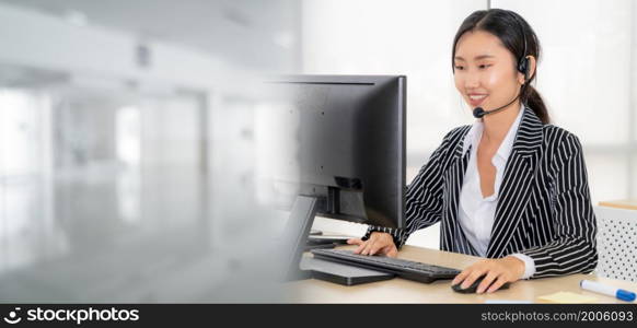 Business people wearing headset working in office to support remote customer or colleague. Call center, telemarketing, customer support agent provide service in broaden view .. Business people wearing headset working in office broaden view