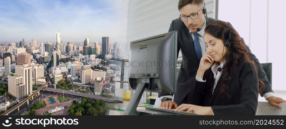 Business people wearing headset working in office to support remote customer or colleague. Call center, telemarketing, customer support agent provide service in broaden view .. Business people wearing headset working in office broaden view