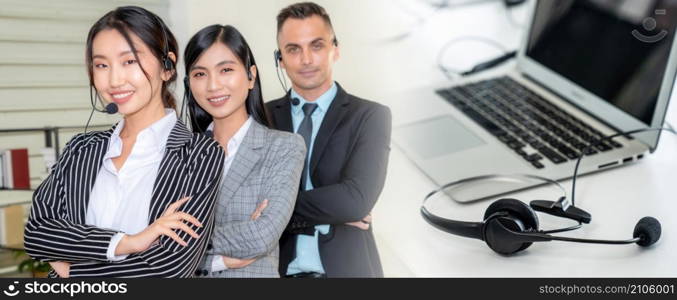 Business people wearing headset working in office to support remote customer or colleague. Call center, telemarketing, customer support agent provide service in broaden view .. Business people wearing headset working in office broaden view