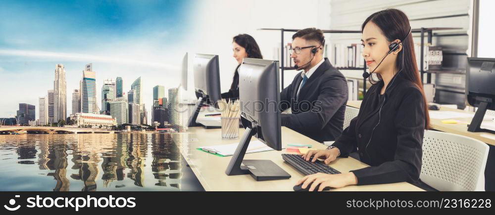 Business people wearing headset working in office to support remote customer or colleague. Call center, telemarketing, customer support agent provide service in broaden view .. Business people wearing headset working in office broaden view