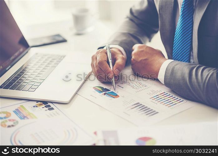 Business people working in the office, they are using a laptop and a digital tablet, flat lay