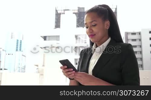 Business people working near office buildings, black female manager. Multi-ethnic businesswoman speaking with telephone, african american girl, woman talking on mobile phone during break