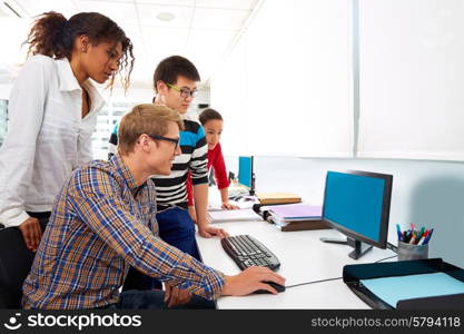 Business people young multi ethnic team in a computer desk office