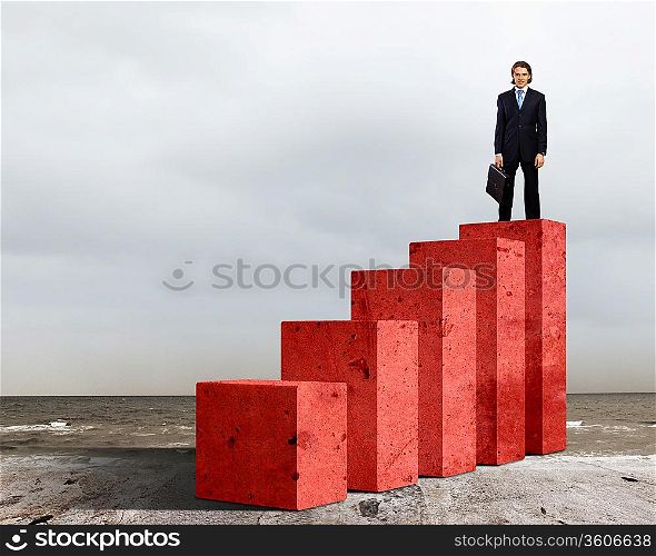 Business person on a graph, representing success and growth