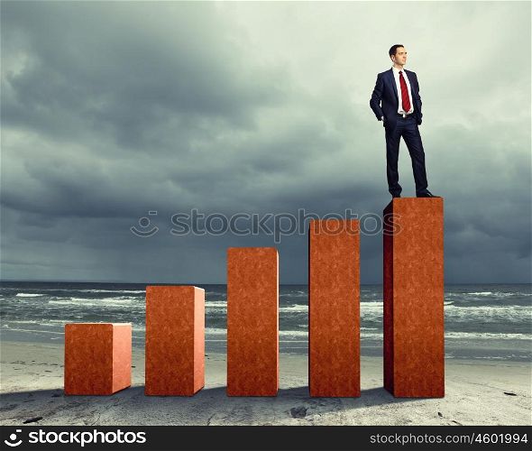 Business person on a graph, representing success and growth