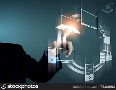 Business person pushing symbols on a touch screen interface