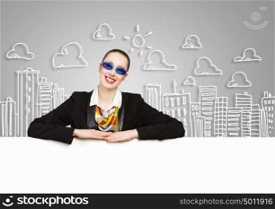 Business person with banner. Image of young businesswoman wearing goggles and holding blank banner