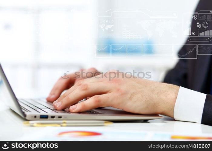 Business person working on computer against technology background