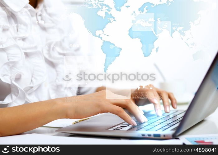 Business person working on computer against technology background