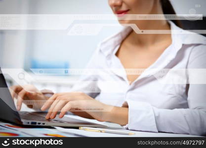 Business person working on computer against technology background