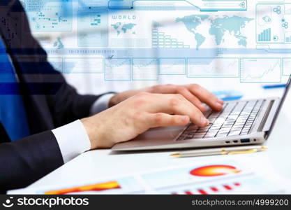 Business person working on computer against technology background