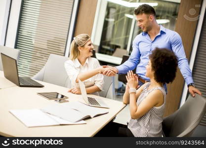 Business persons handshake on  meeting with at modern startup business office interior
