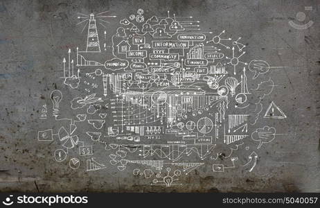 Business plan. Business ideas and sketch on cement wall