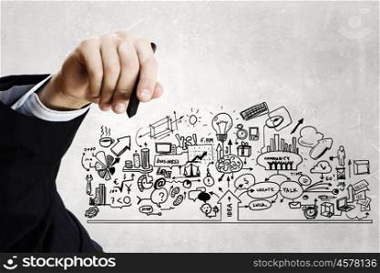Business plan. Close up of businessman drawing business sketches on screen