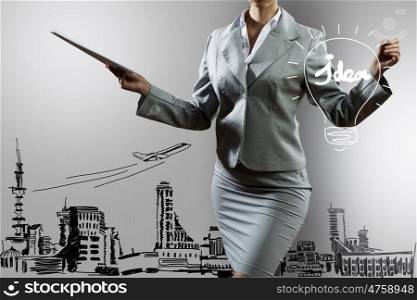 Business planing. Body of businesswoman drawing business strategy sketches