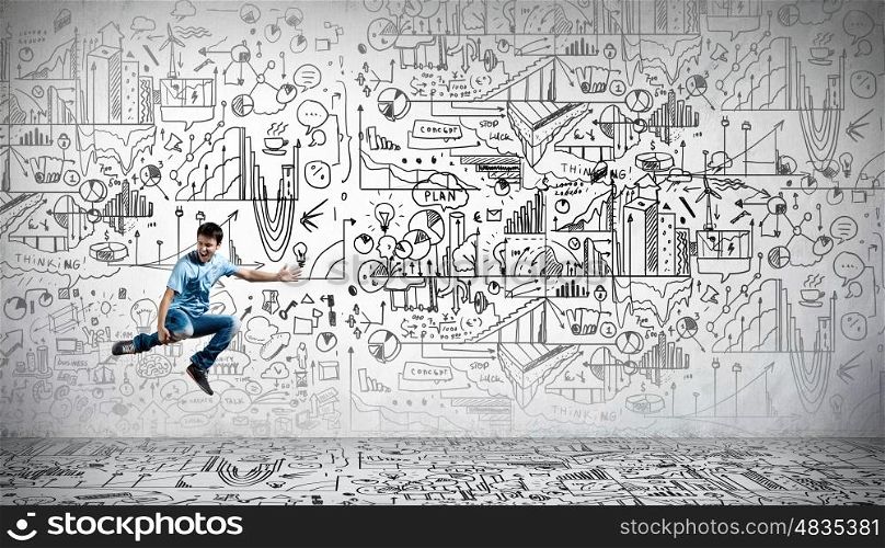Business planning. Funny image of running businessman on background of business plan