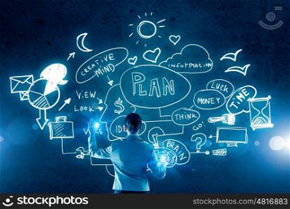 Business planning. Rear view of businesswoman working with virtual panel