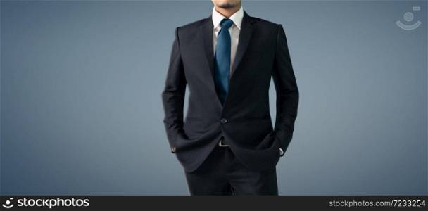 Business portrait of handsome man in a black suit