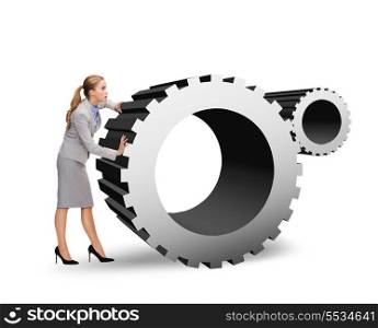business, post and transportation concept - busy businesswoman pushing cogwheel