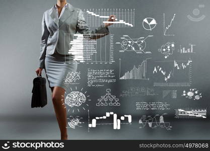 Business presentation. Bottom view of businesswoman drawing business sketches