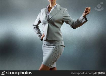 Business presentation. Bottom view of businesswoman holding pen in hand