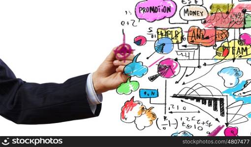 Business presentation. Close up of businessman with documents in hand drawing business sketches