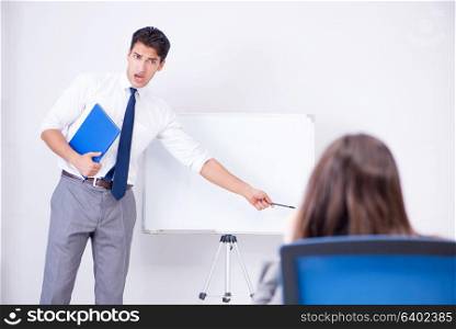 Business presentation in the office with man and woman