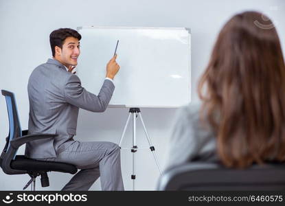 Business presentation in the office with man and woman