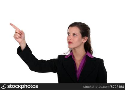 Business professional pointing her index finger