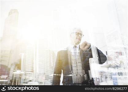 business, punctuality and people concept - senior businessman checking time on wristwatch or smart watch on his hand in city with double exposure effect. senior businessman checking time on his wristwatch