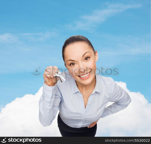 business, real estate and banking concept - smiling businesswoman with house keys