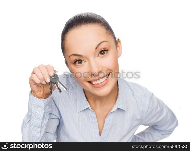 business, real estate and banking concept - smiling businesswoman with house keys